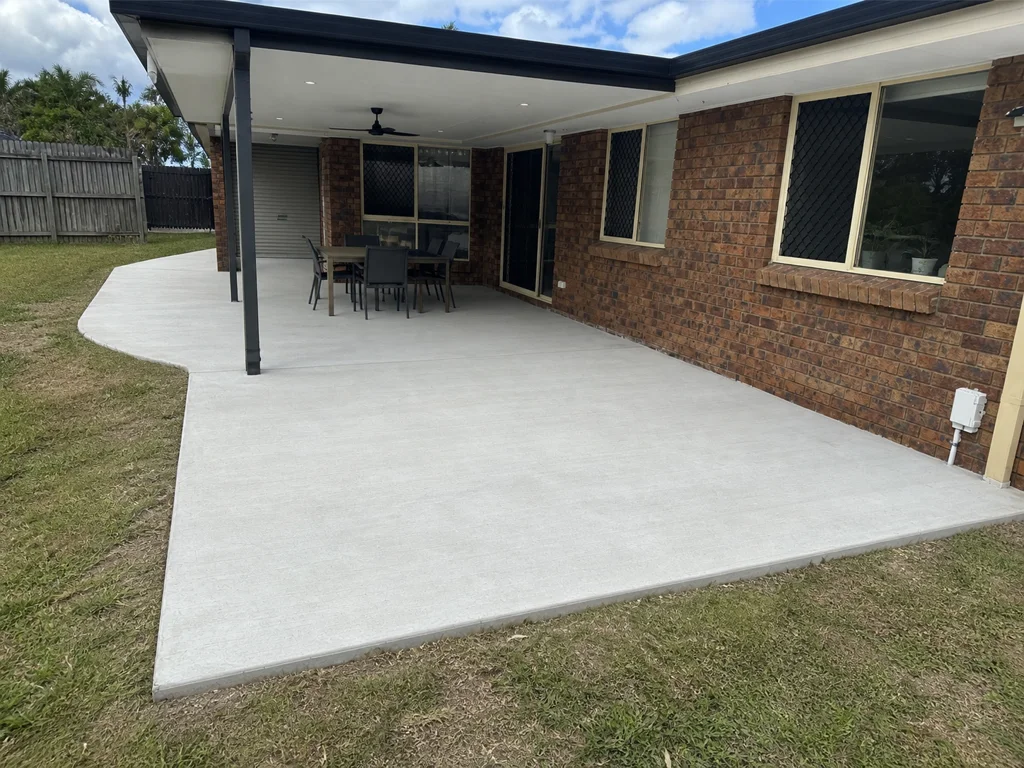 Finished concrete alfresco patio beside a Brisbane home
