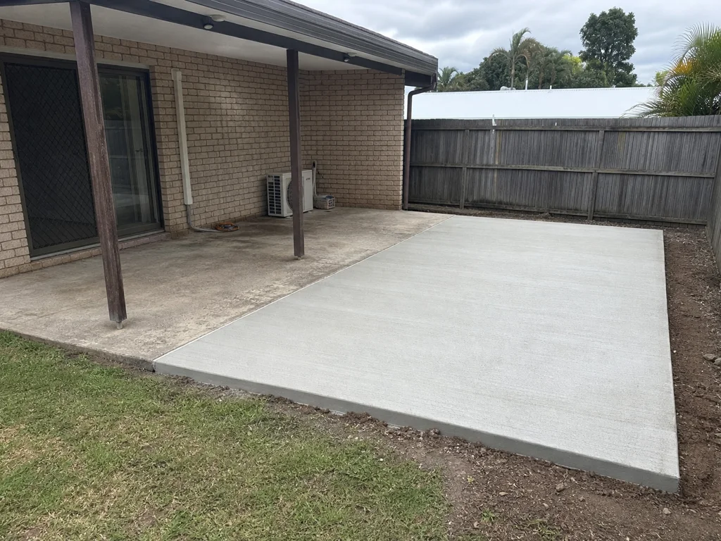 New concrete patio extension joined to an existing slab